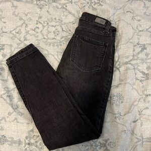 Black washed jeans with knee rip